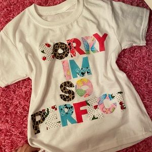 Sorry I’m so perfect baby tee